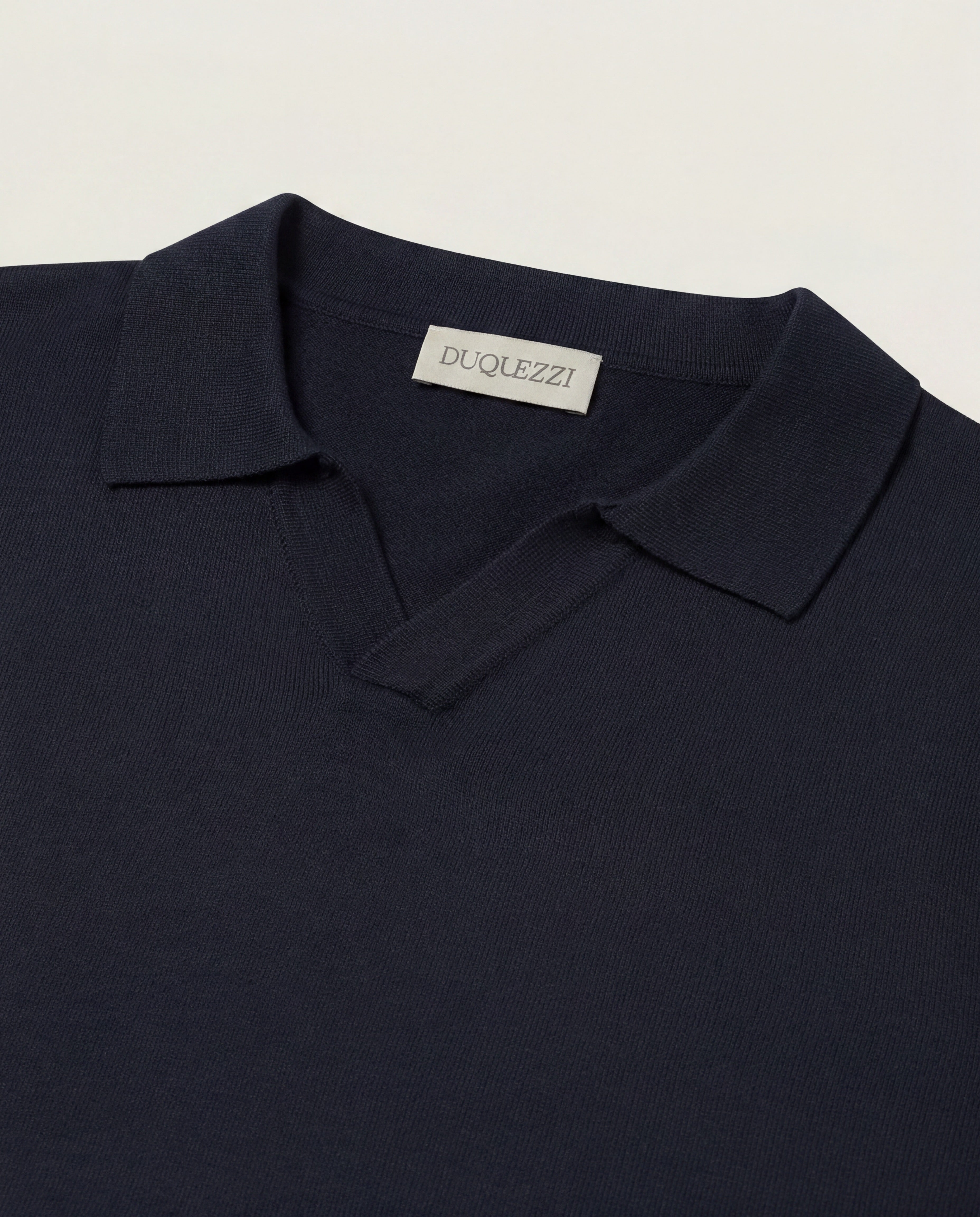 DUQUEZZI MERINO BUTTONLESS POLO | Navy